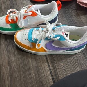 Nike Kids Sneakers in Orange, Green, Purple, and Blue